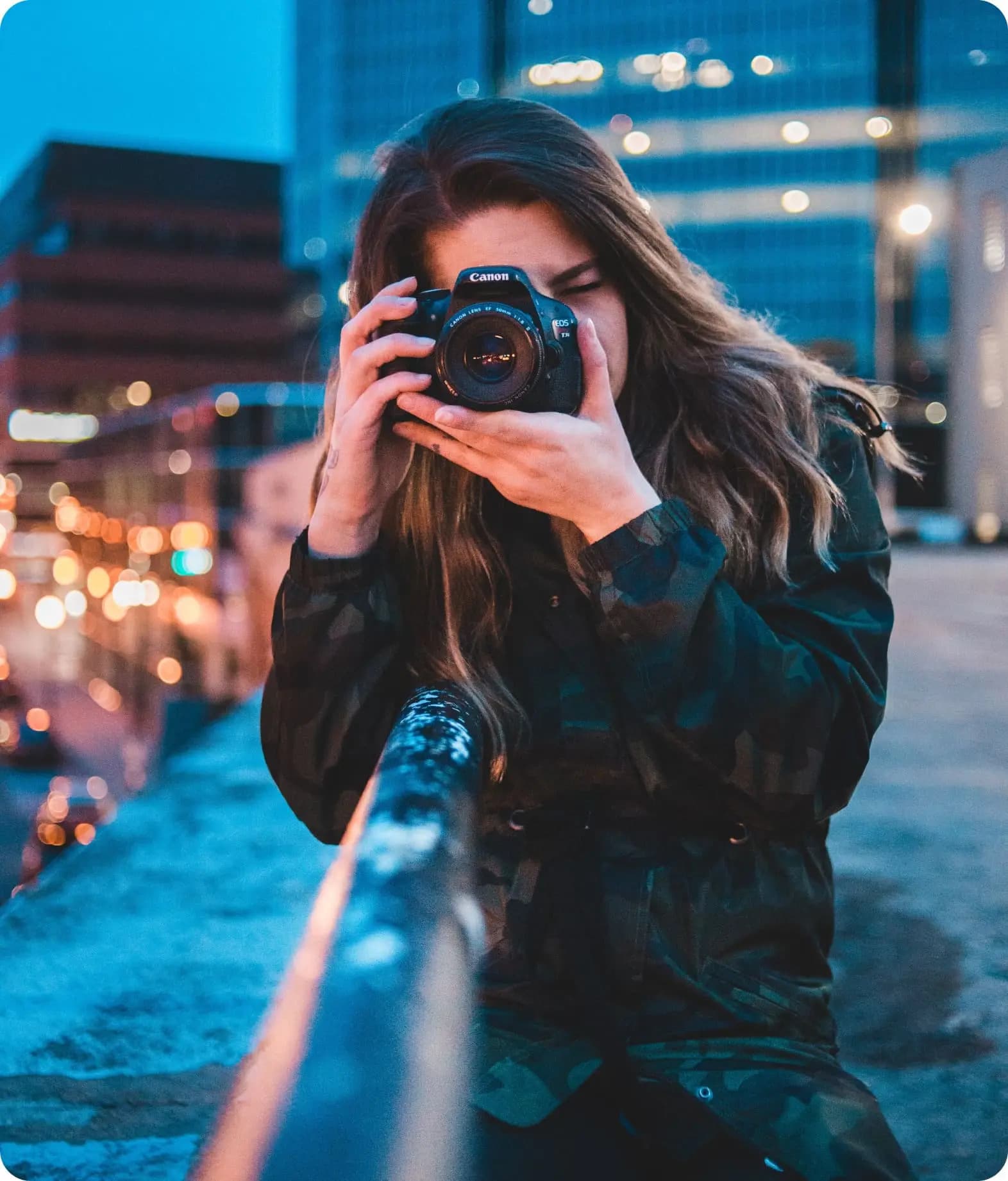 Photographer working with her own camera